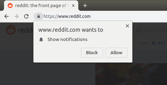A screenshot of Reddit blacking out the website until one closes the 
notification prompt.